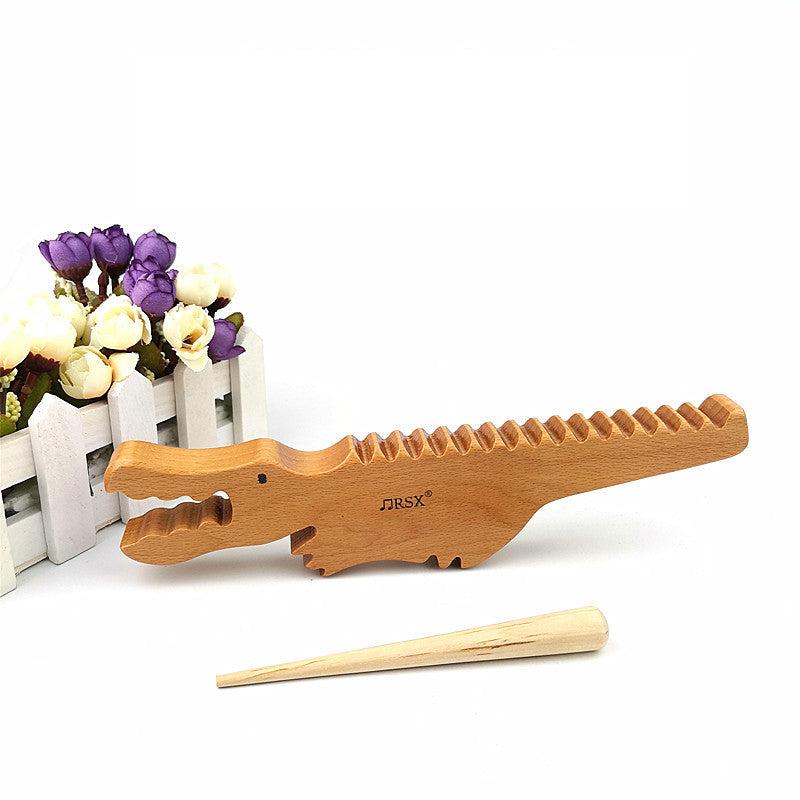 Wooden_alligator_music_toy._Sound_sensory_exploration_toy_alligator-music-toy-1