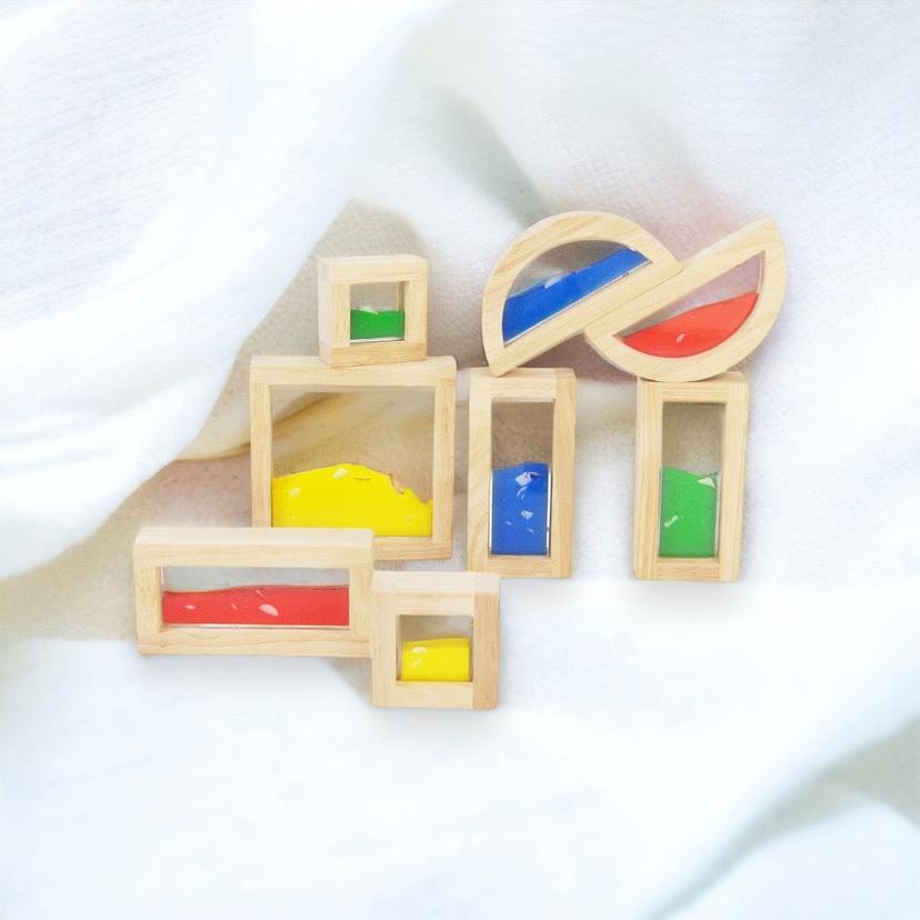Wooden_sensory_blocks,_liquid_with_fish,_sand_with_shells_or_beads_with_sound_wooden-sensory-blocks-6