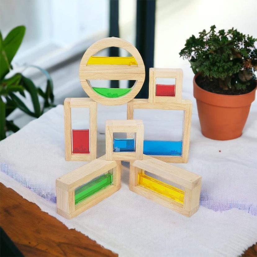 Wooden_sensory_blocks,_liquid_with_fish,_sand_with_shells_or_beads_with_sound_wooden-sensory-blocks-1