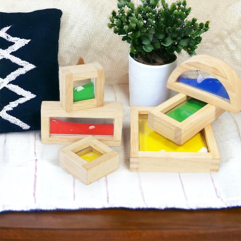 Wooden_sensory_blocks,_liquid_with_fish,_sand_with_shells_or_beads_with_sound_wooden-sensory-blocks-2