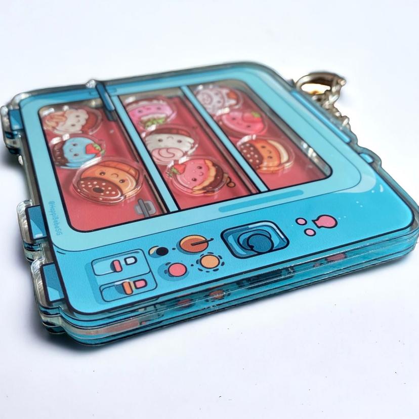 Novelty_shakable_cute_adorable_cupcake_keychain_souvenir_shakable-keychain-cupcake