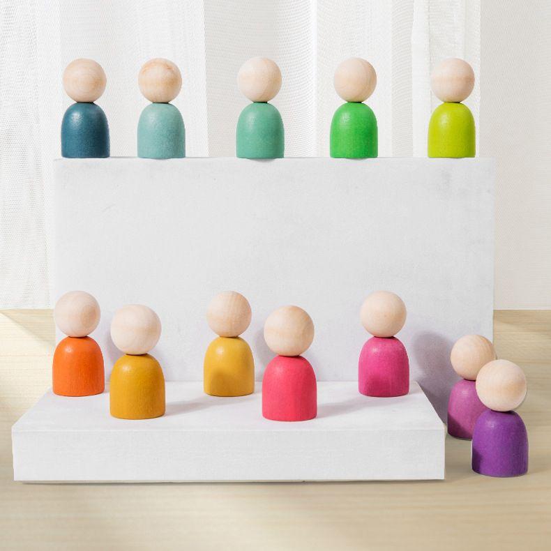 Montessori_inspired_Wooden_colour_sorting_rings_and_mini_figurines.__Early_learning_toy_colour-sorting-wooden-rings-